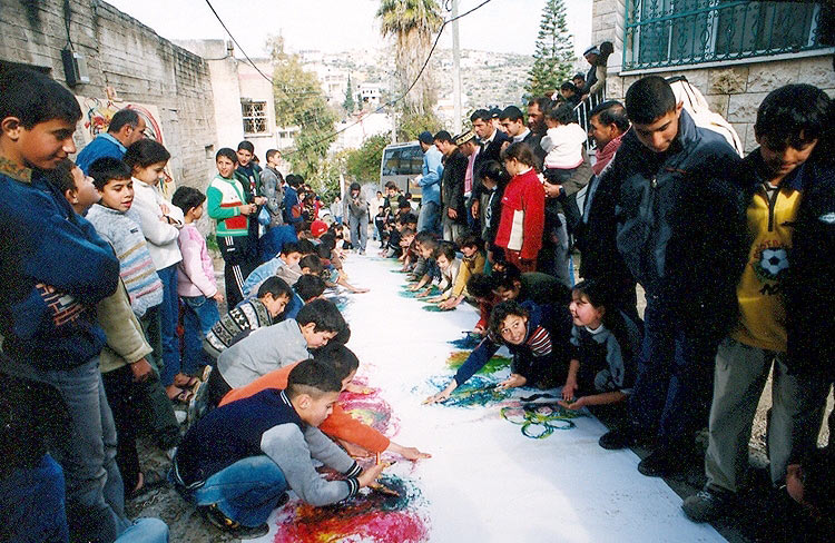 Teenagers Creating Artwork Together As Part Of Windows For Peace’s Youth Media Programme, 2002.