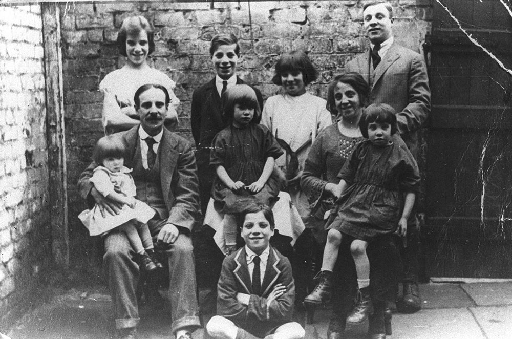 Emmanuel And Bella With Their Family In Their Backyard, C.1925. Seated Front Are David, Emmanuel (with Nettie On His Knee), Sadie, Bella (with Esther On Her Knee), And Behind Are Elizabeth, Michael, Jean And Elias.
