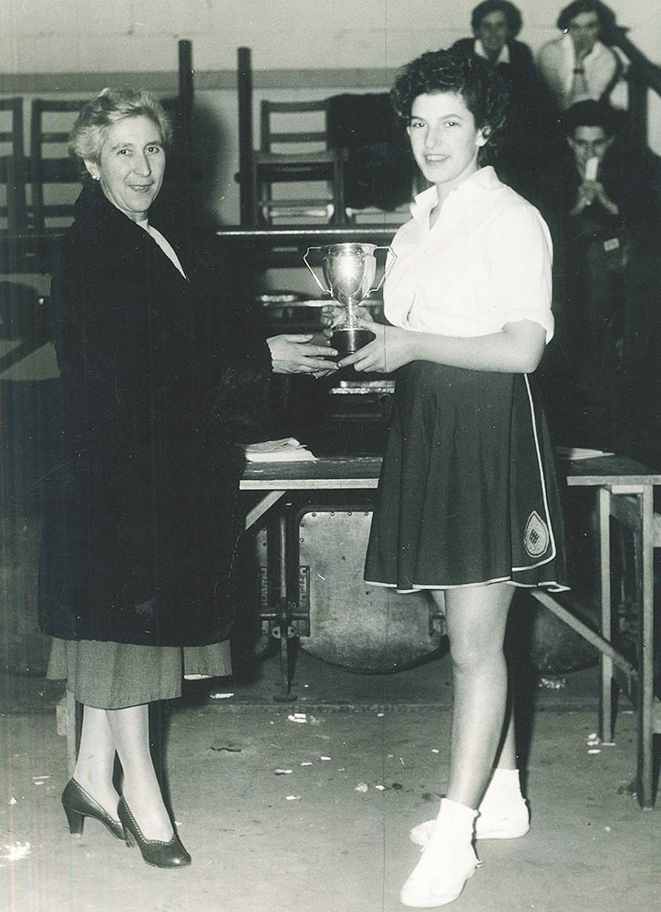 Joy Accepting A Trophy As Captain Of Maccabi Brighton And Hove Netball Team19 C.1956.